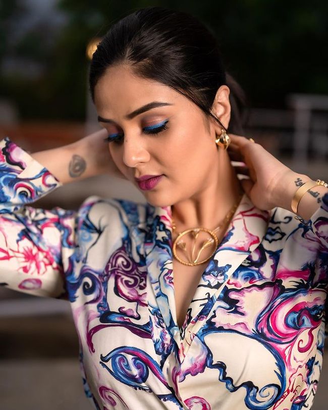 Vivacious Looks Of Sreemukhi In Colorful Dress